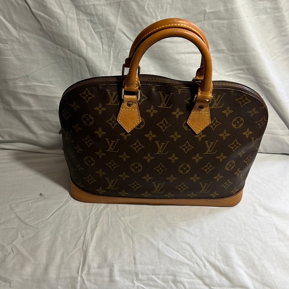 Louis Vuitton Handbags - Authentic Louis Vuitton Alma .